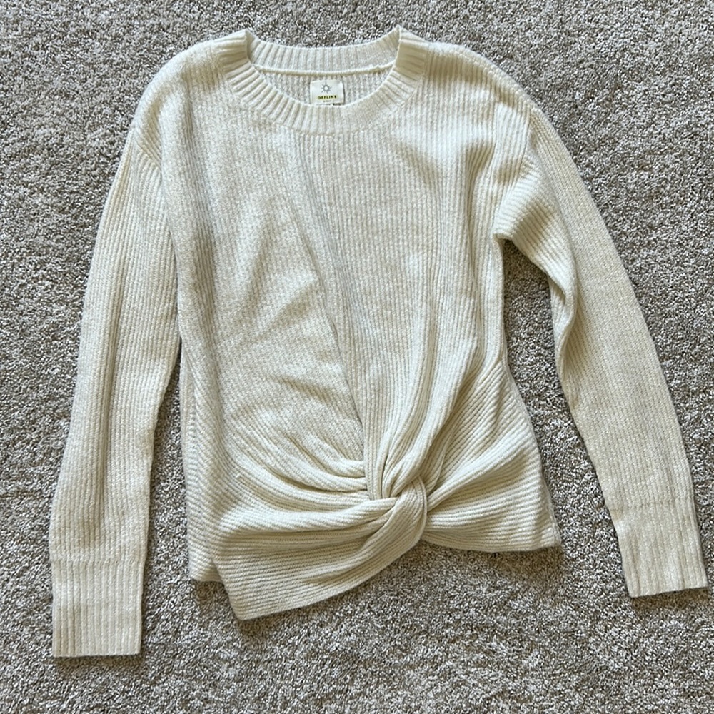 Knotted cream sweater